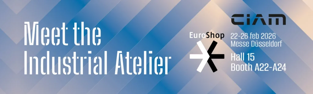 EuroShop banner with text: Meet the Industrial Atelier, EuroShop, 22-26 Feb 2026, Messe Düsseldorf, Hall 15, Booth A22-A24, and CIAM over a blue and beige geometric background.